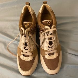 Brand new out of box Michael Kors snakeskin sneakers.